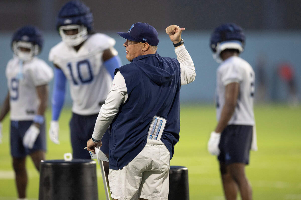 North Carolina defensive coordinator Geoff Collins works with his players during the Tar Heels’ first practice of the season on Monday, July 29, 2024 in Chapel Hill, N.C.