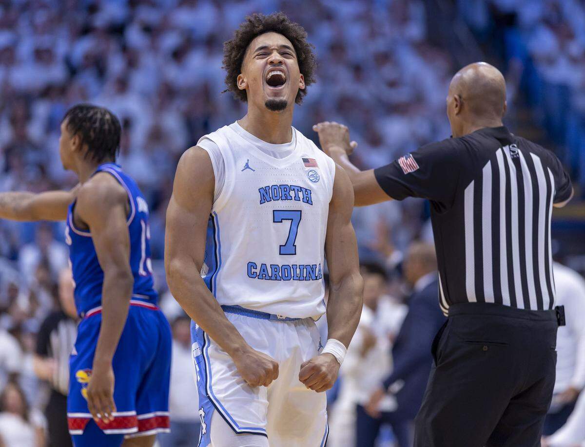 North Carolina guard Seth Trimble (7) reacts after forcing a turnover by Kansas guard Elmarko Jackson (13) in the first half on Friday, November 7, 2025 at the Smith Center in Chapel Hill, N.C.