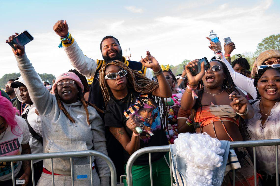 Fans dance during Jeezy’s set at the second day of Dreamville Festival in Raleigh, N.C. on Sunday, April 7, 2024.