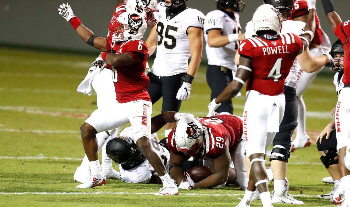 N.C. State defensive tackle Alim McNeill (29) recovers the fumble during the second half of N.C. State’s 45-42 victory over Wake Forest at Carter-Finley Stadium in Raleigh, N.C, Saturday, Sept. 19, 2020.