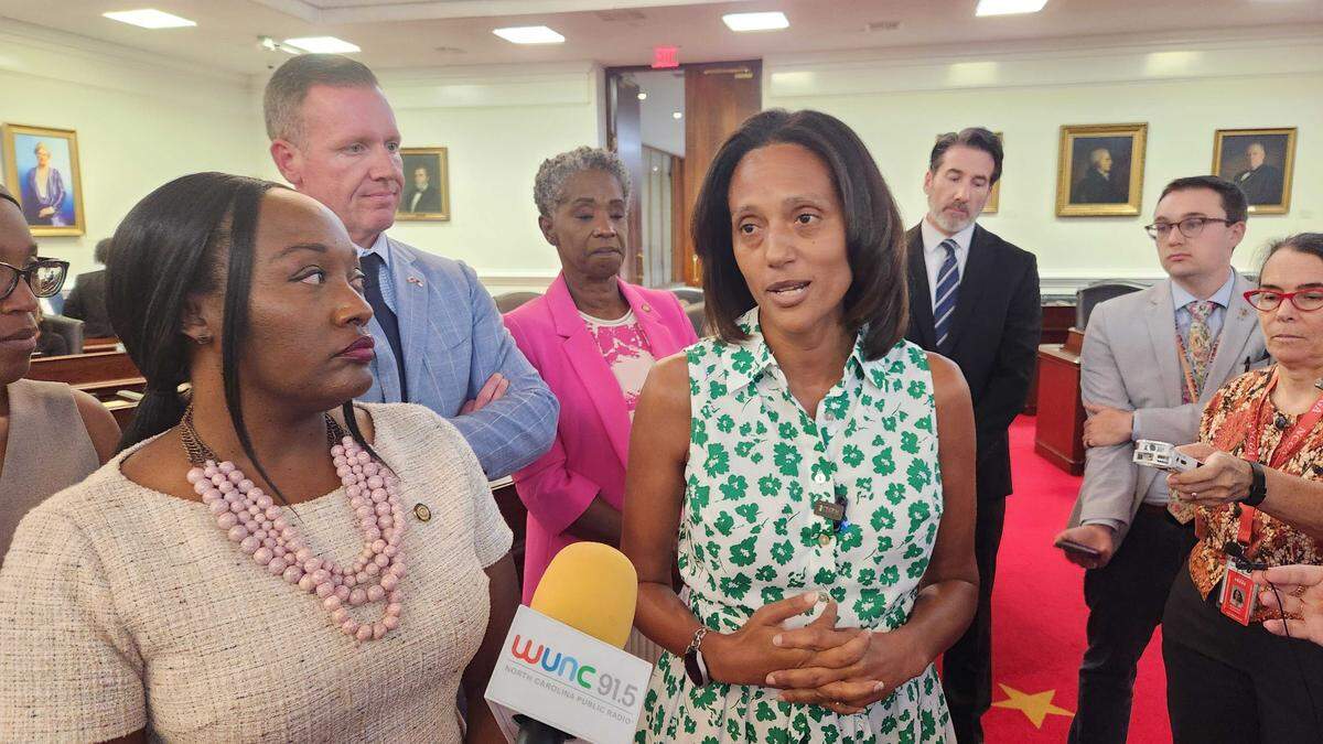 North Carolina Senate Democratic Leader Sydney Batch, center, talks with reporters after the Senate session on Tuesday, July 29, 2025 at the N.C. Legislative Building in downtown Raleigh.