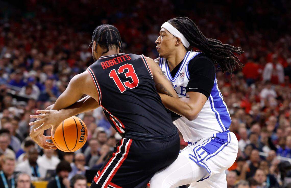 Duke’s Maliq Brown (6) knocks the ball from the hands of Houston’s J’Wan Roberts (13) during the first half of Duke’s game against Houston in the NCAA men’s national semifinal at the Alamodome in San Antonio, Texas, Saturday, April 5, 2025.