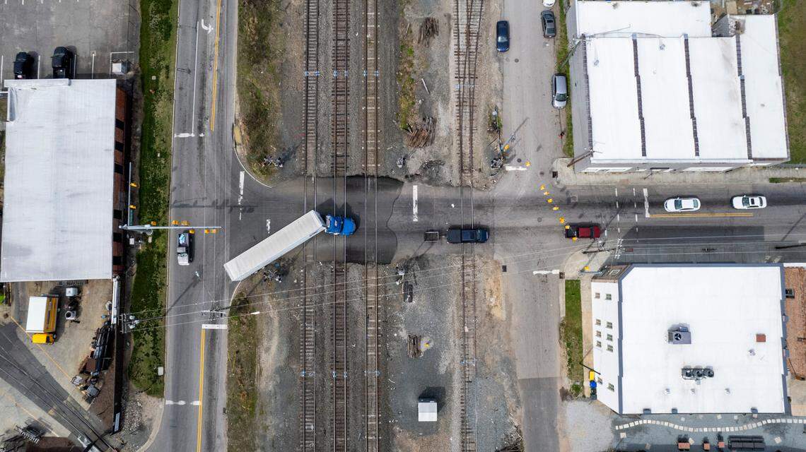 Traffic crosses a rail crossing on Driver Street in Durham on Friday, March 22. Durham County is embarking on an 18-month study to determine if and how to replace three crossings in East Durham, including this one where a man was killed when his car was hit by a train earlier this month.
