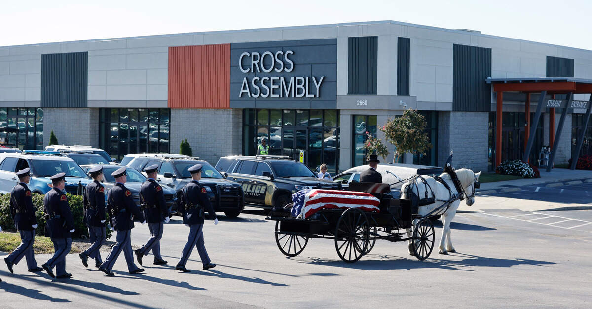 A funeral caisson transports the casket of Raleigh Police Officer Gabriel Torres to Cross Assembly Church in Raleigh, N.C. for his funeral Saturday, Oct. 22, 2022.