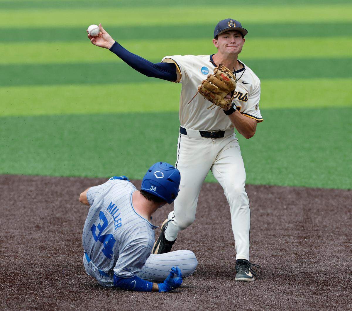 Murray State’s Conner Cunningham (14) gets ready to turn two as he forces out Duke’s Ben Miller (34) in the third inning during Duke’s game against Murray St. in the second game of Durham Super Regional at Jack Coombs Field in Durham, N.C., Sunday, June 8, 2025.