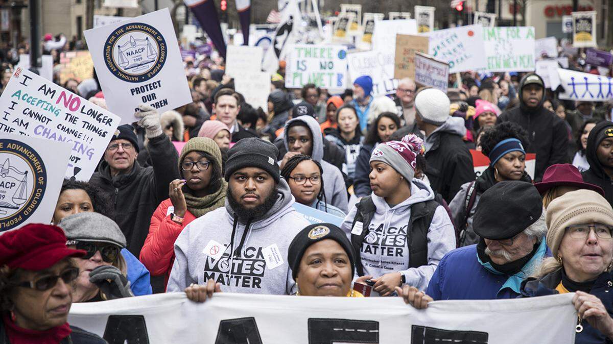 Hundreds of people marched and rallied in downtown Raleigh in February, where testimonies and speeches called for a continued push to expand health care, voting rights and other steps to improve the lives of North Carolinians, particularly children. BY JULIA WALL