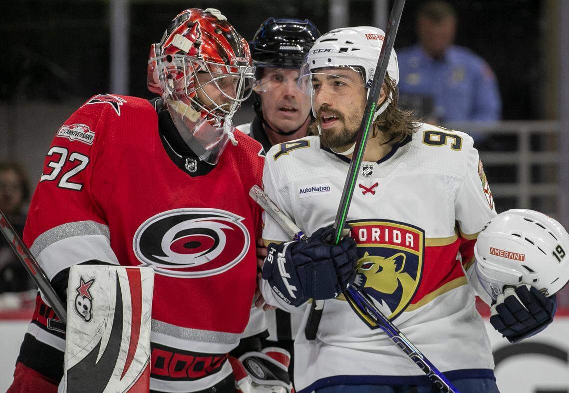 The Florida Panthers Ryan Lomberg (94) has a word with Carolina Hurricanes goalie Antii Raanta (32) in the second period during Game 2 of the Eastern Conference Finals on Saturday, May 20, 2023 at PNC Arena in Raleigh, N.C.