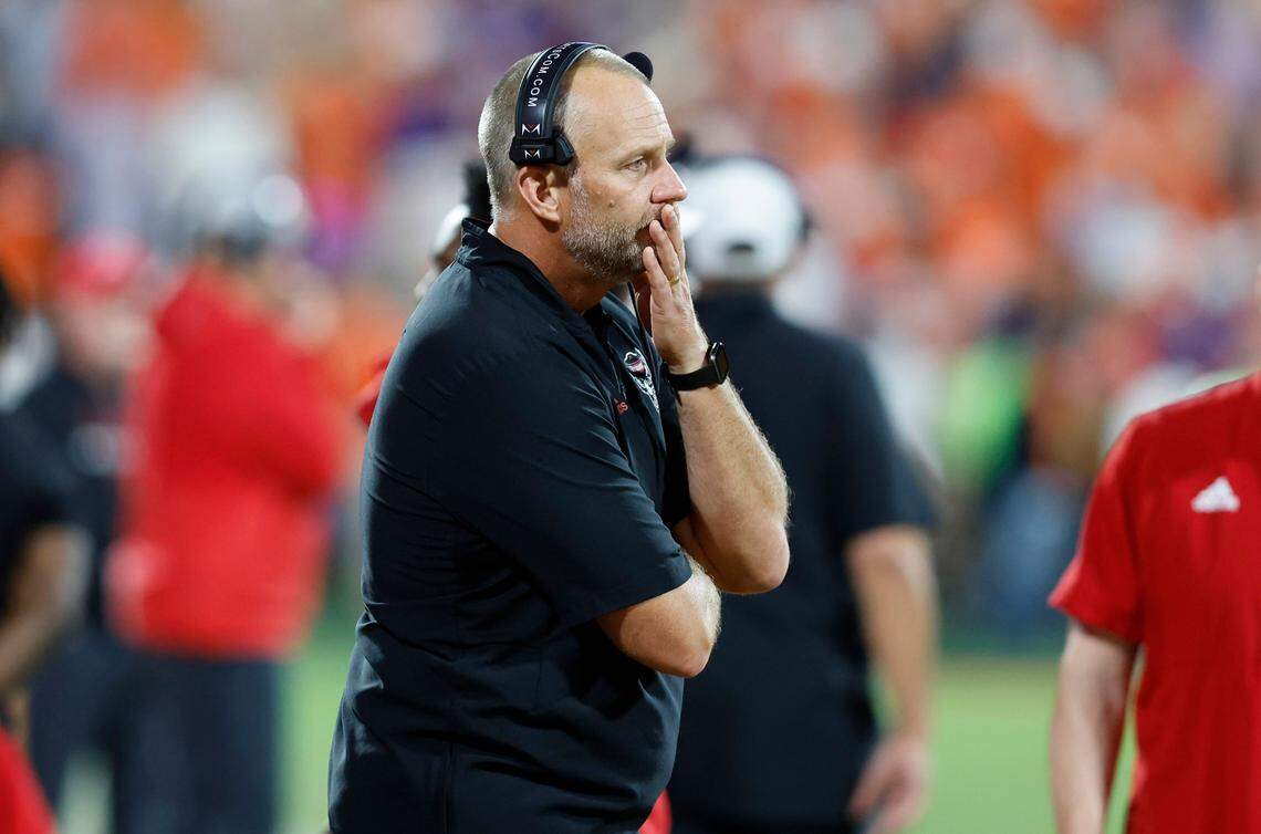 N.C. State head coach Dave Doeren watches during a timeout during the second half of Clemson’s 30-20 victory over N.C. State at Memorial Stadium in Clemson, S.C., Saturday, Oct. 1, 2022.