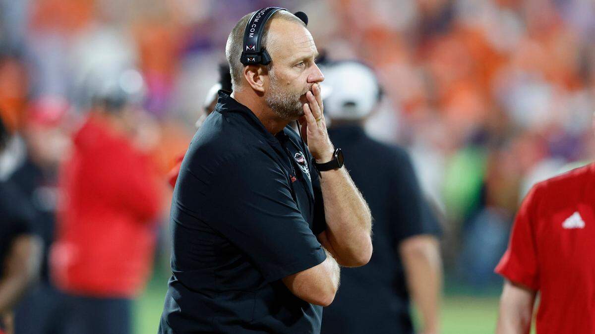 N.C. State head coach Dave Doeren watches during a timeout during the second half of Clemson’s 30-20 victory over N.C. State at Memorial Stadium in Clemson, S.C., Saturday, Oct. 1, 2022.