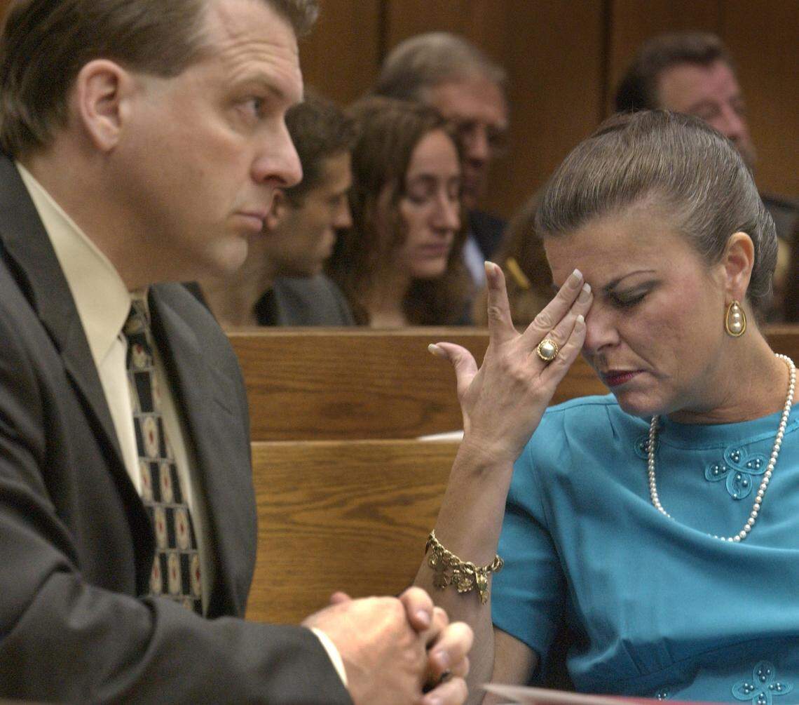 Durham DA Jim Hardin (left) and assistant DA Freda Black react as Judge Orlando Hudson reads a letter WTVD reporter Sonya Pfeiffer sent out to jurors in the Michael Peterson murder trial. Pfieffer said the letter was supposed to be sent out after the verdict.