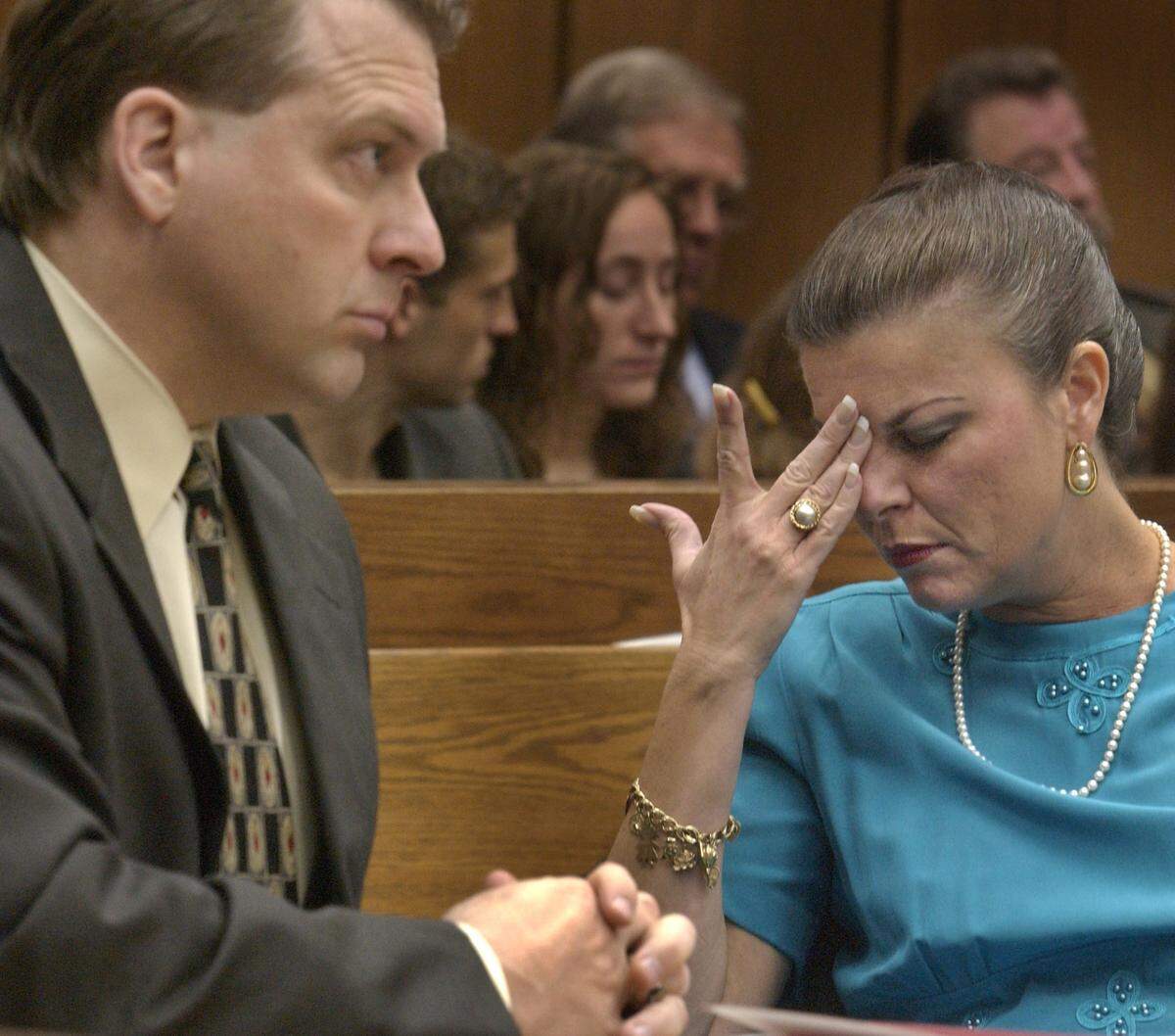 Durham DA Jim Hardin (left) and assistant DA Freda Black react as Judge Orlando Hudson reads a letter WTVD reporter Sonya Pfeiffer sent out to jurors in the MichaelPeterson murder trial. Pfieffer said the letter was supposed to be sent out after the verdict.