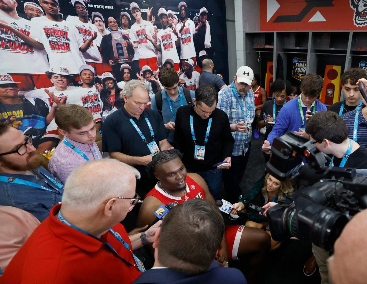 N.C. State’s DJ Burns Jr. talks to the media in the locker room at State Farm Stadium in Glendale, Arizona on April 4, 2024. 