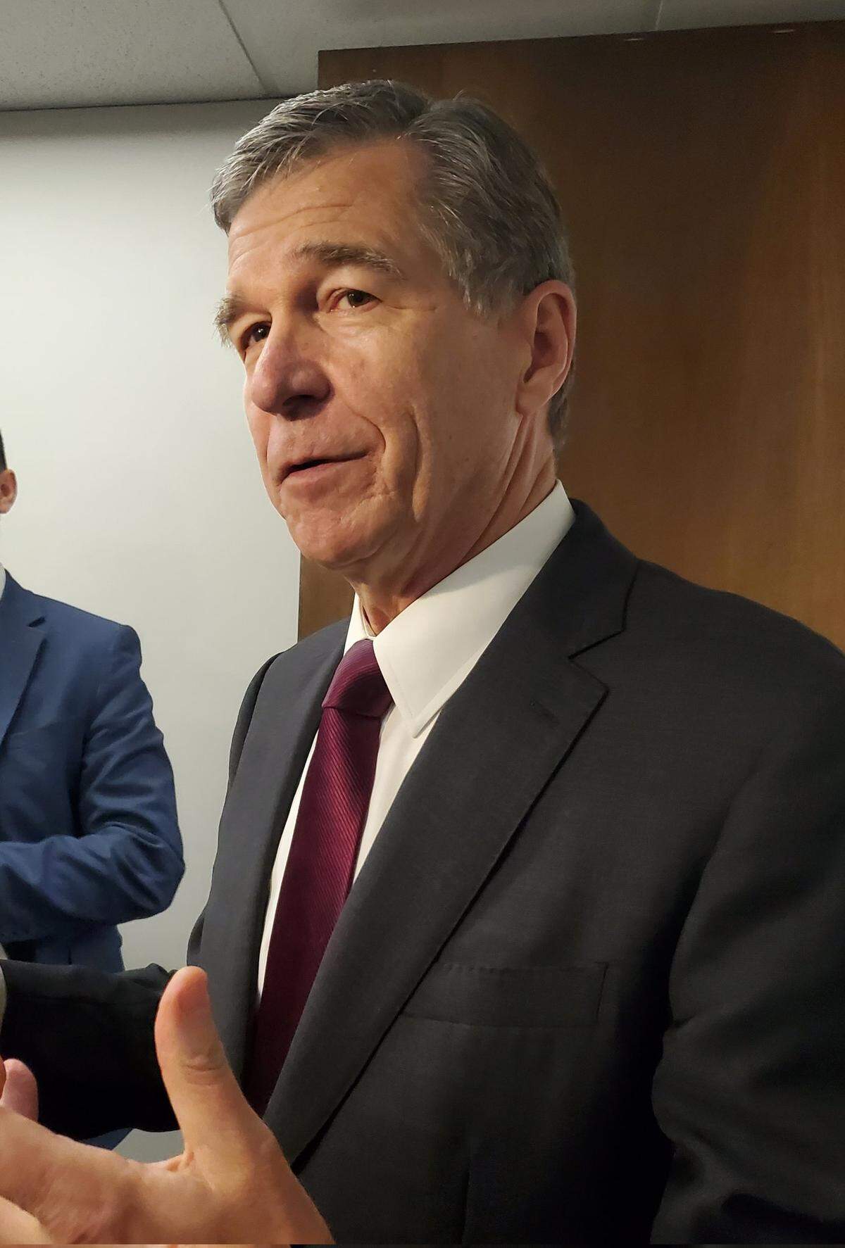 North Carolina Gov. Roy Cooper talks to reporters after a Council of State meeting on Tuesday, June 7, 2022 at the Department of Transportation in downtown Raleigh.