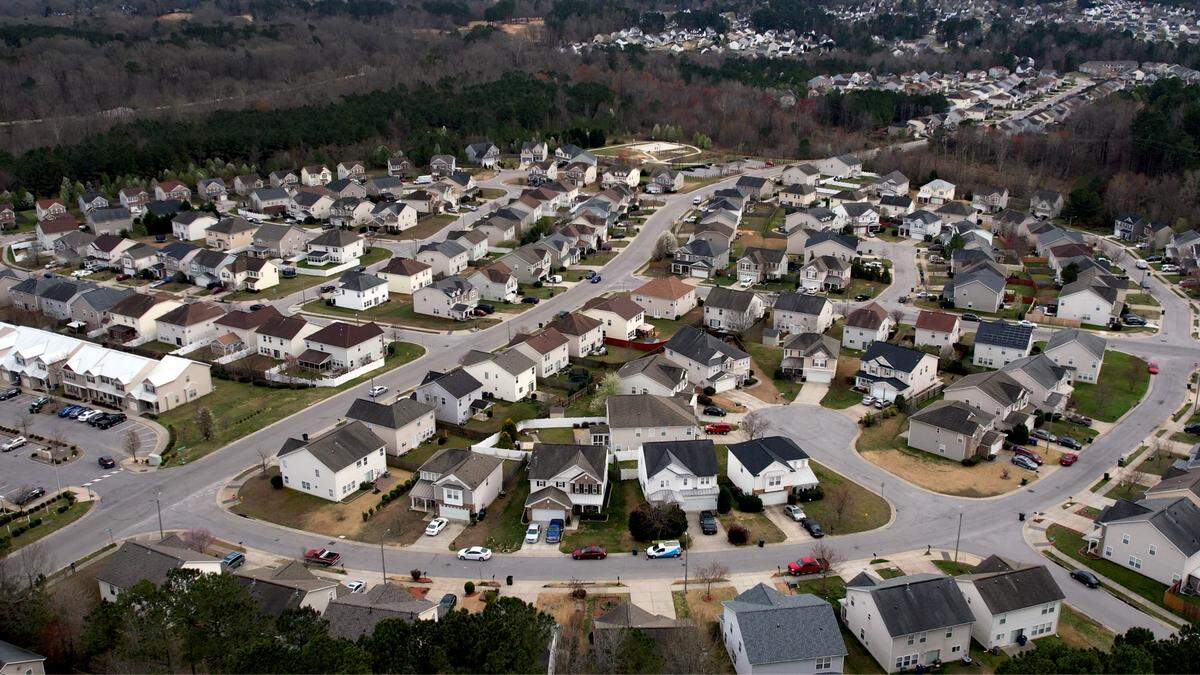 An aerial view of the Barrington Village subdivision southeast of downtown Raleigh. Single-family properties are especially lucrative for investment companies that buy such homes, rent them out and turn them into profit generators.