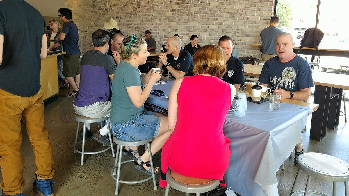 The Carrboro Police Department holds regular Coffee with a Cop events at local coffee shops to connect with the community and hear feedback and concerns. Weaver Street Market canceled an April 2023 event to take a closer look at the issue.