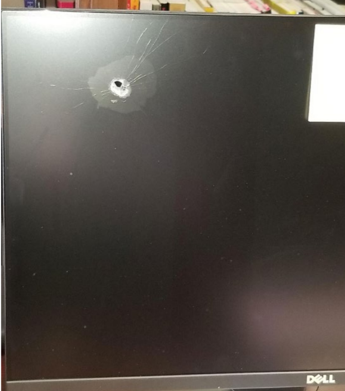 Bullets flew into the Guilford County Sheriff’s Office as shooting suspects tried to gun down a victim outside. One stray round shot through an employees computer monitor.