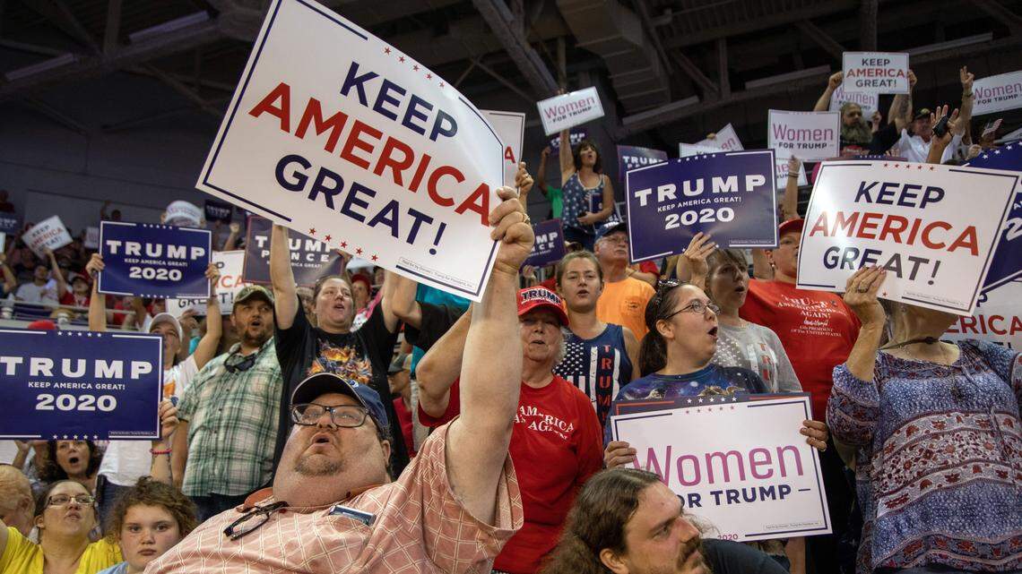 Supporters await the arrival of President Donald Trump and Vice President Mike Pence prior to a campaign rally Wednesday , July 17, 2019 East Carolina University in Greenville, NC.