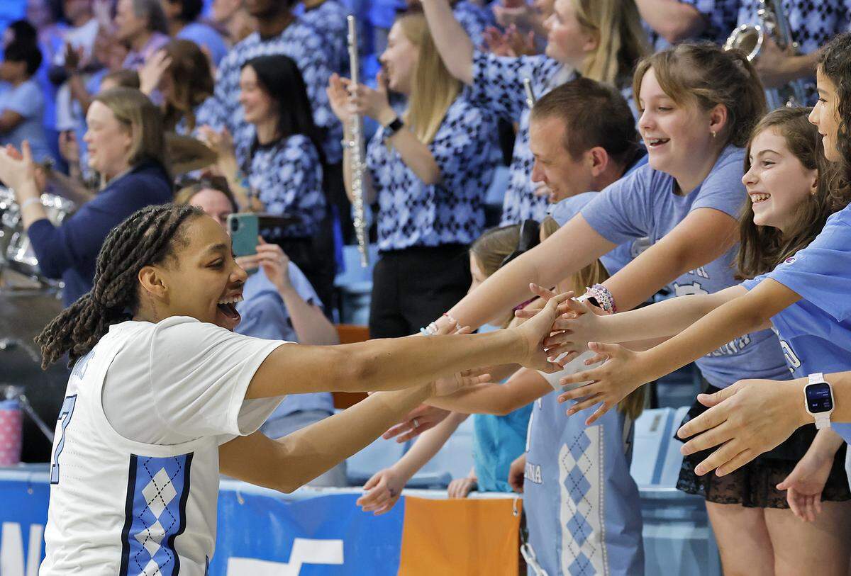 North Carolina’s Nyla Brooks high-fives fans following the Tar Heels’ 74-66 second-round NCAA Tournament win over Maryland on Sunday, March 22, 2026, at Carmichael Arena in Chapel Hill, N.C.