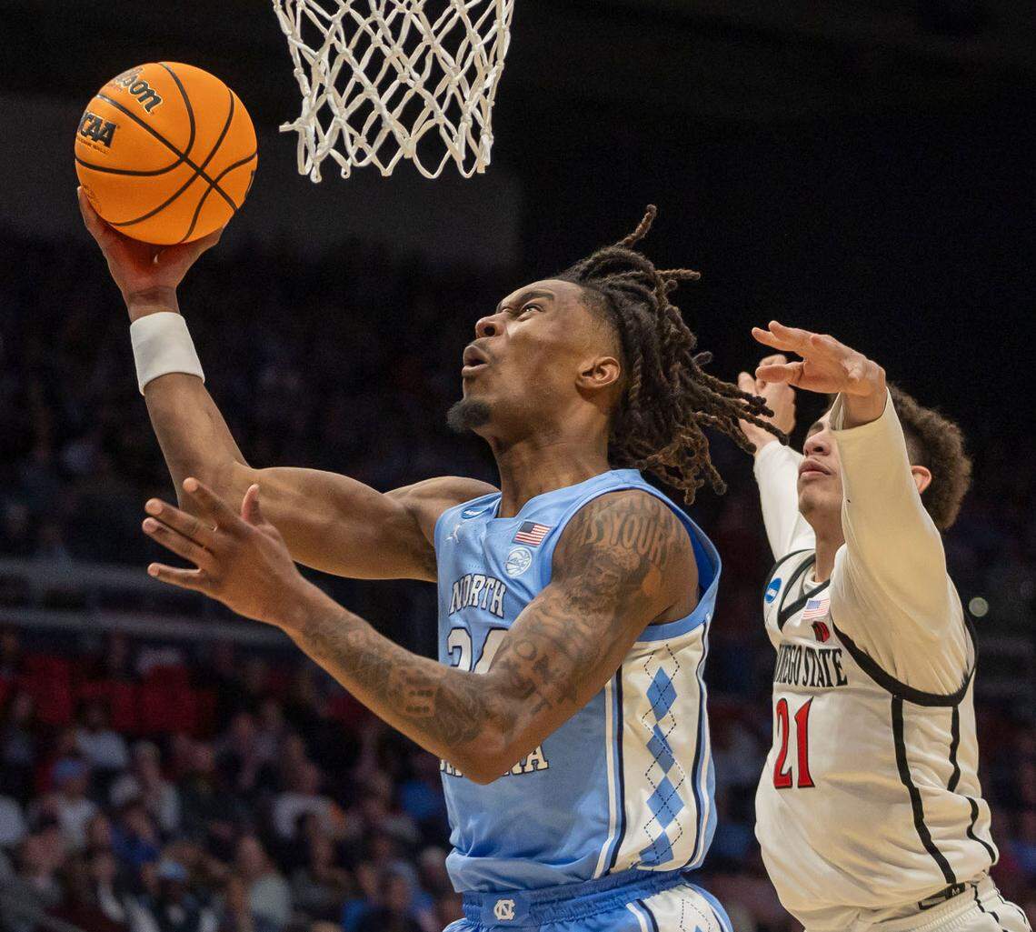 North Carolina forward Jae’Lyn Withers (24) breaks to the basket against San Diego State’s Miles Byrd (21) in the second half during the NCAA First Four on Tuesday, March 18, 2025 at the University of Dayton Arena in Dayton, Ohio.