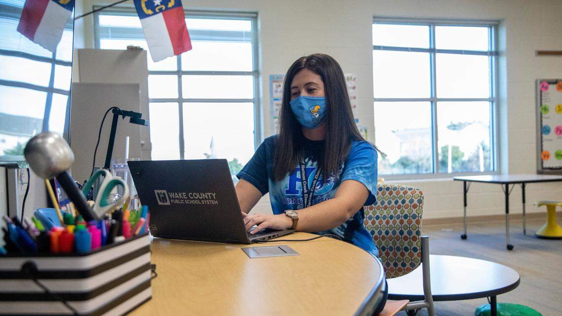 Second-grade teacher Kelly Hurry prepares for students to return to in-person instruction at Hortons Creek Elementary School in Cary Friday, Oct. 23, 2020. Some Wake County Elementary students will return the classroom on Monday for the first time since schools closed in March due to the coronavirus pandemic.