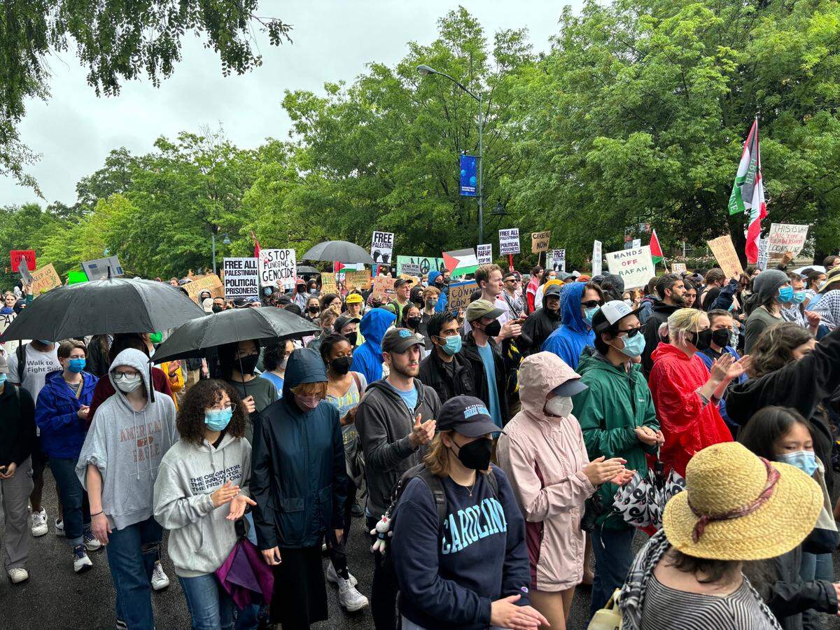 Stand with Palestine protesters march down Franklin Street in Chapel Hill on May 5, 2024.