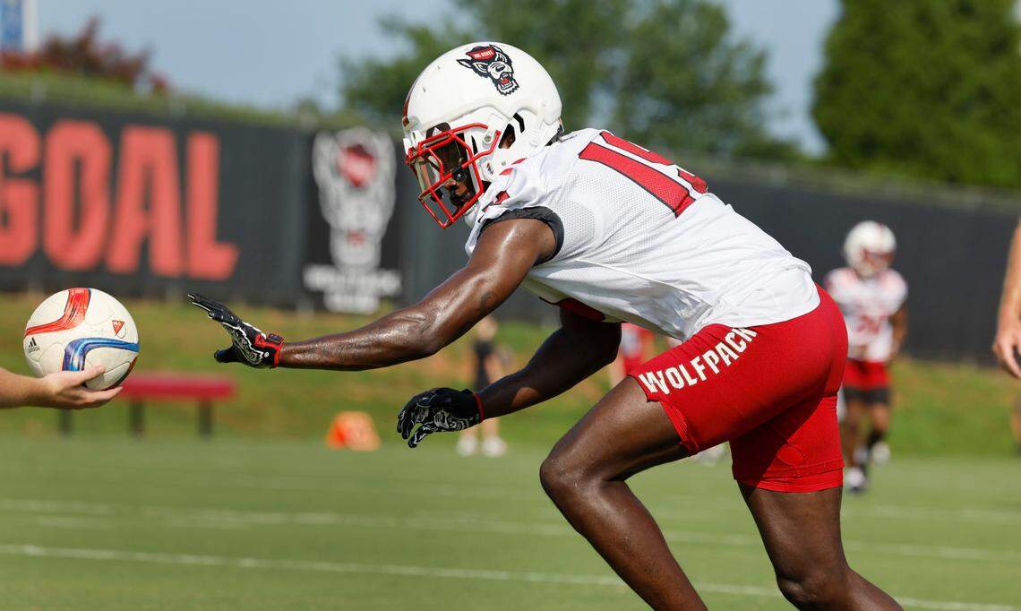 N.C. State safety KJ Martin (19) runs a drill during the Wolfpack’s first practice in Raleigh, N.C., Wednesday, July 31, 2024.