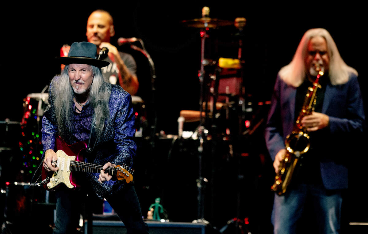 Patrick Simmons on guitar and Marc Russo on sax bring the crowd to its feet as The Doobie Brothers open for the Eagles on ‘The Long Goodbye’ Final Tour to Raleigh, N.C.’s PNC Arena, Thursday night, Nov. 9, 2023.