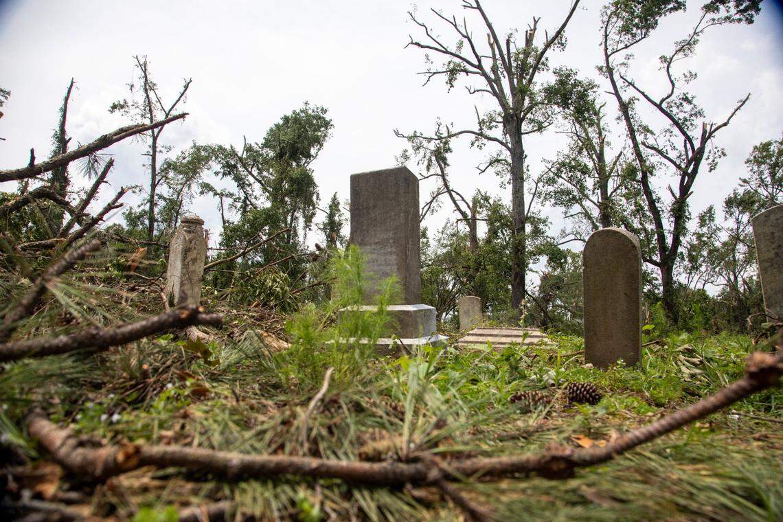 Downed trees and limbs lay in the path of a tornado in a cemetery near Rocky Mount Thursday, July 20, 2023. An EF3, tornado with wind speeds of 150 mph touched down in Nash County Wednesday around 12:30 p.m. Wednesday according to the Raleigh National Weather Service.