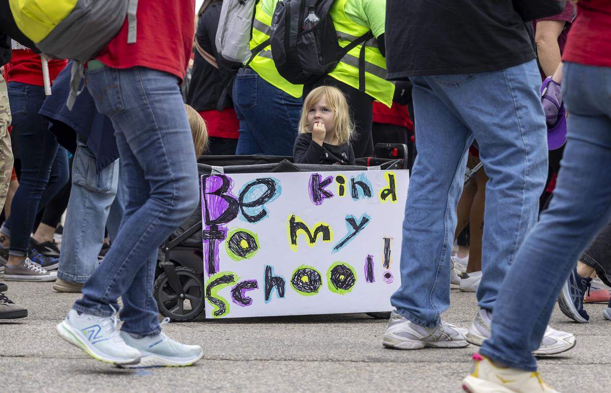 Demonstrators begin their march along Wilmington Street, heading for the State Capitol, during the May Day protests, calling for higher teacher pay, on Friday, May 1, 2026 in Raleigh, NC.