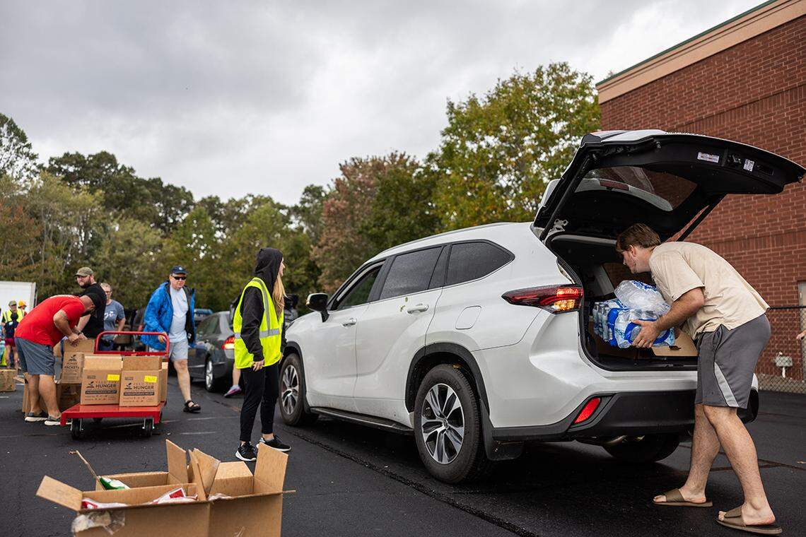 Volunteers with Biltmore Church Arden Campus give out water, ice, and meals in Arden, N.C. on Monday, September 30, 2024.