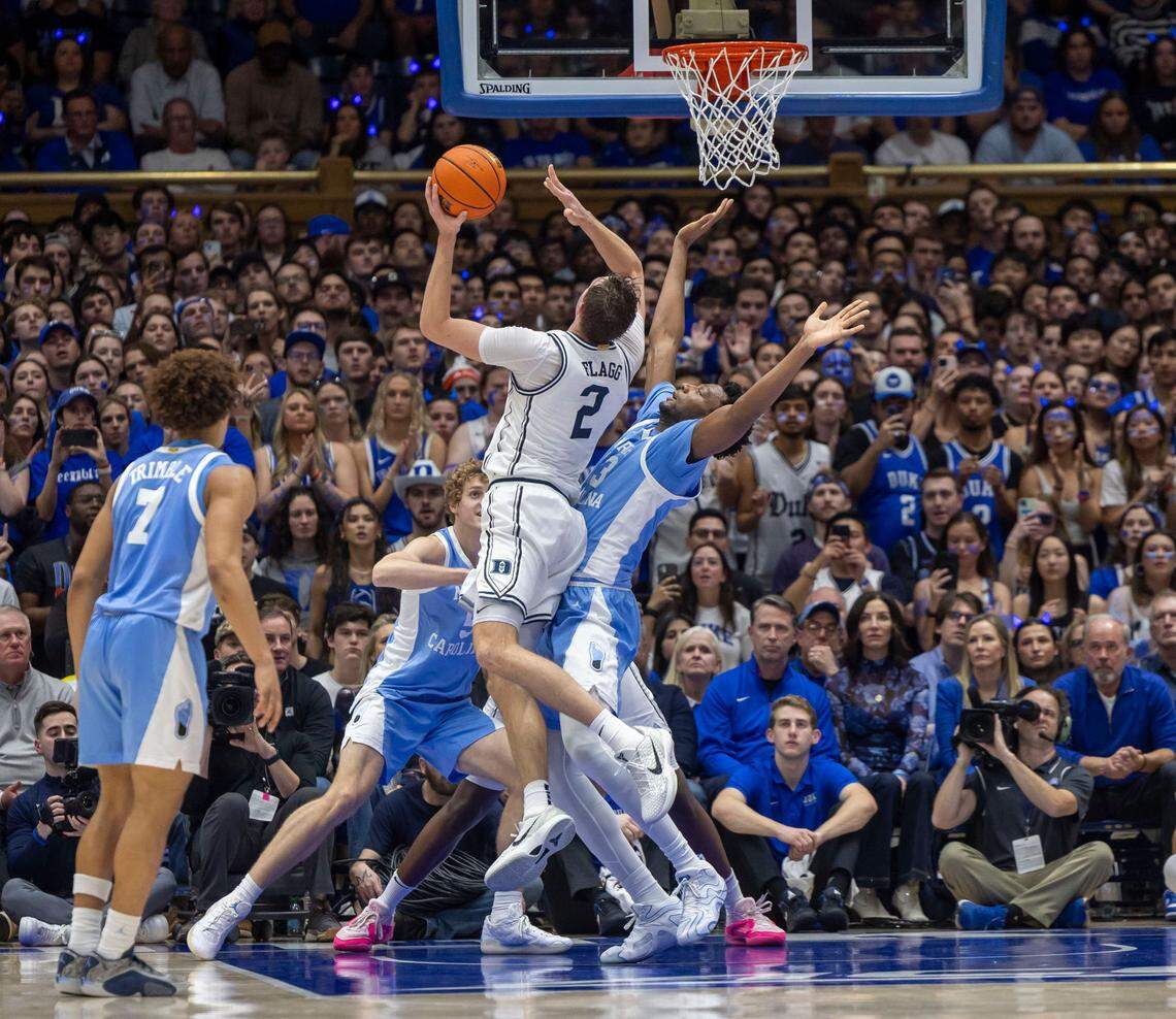 Duke’s Coper Flagg (2) works to the basket against North Carolina forward Jalen Washington (13) in the second half on Saturday, February 1, 2025 at Cameron Indoor Stadium in Durham, N.C.
