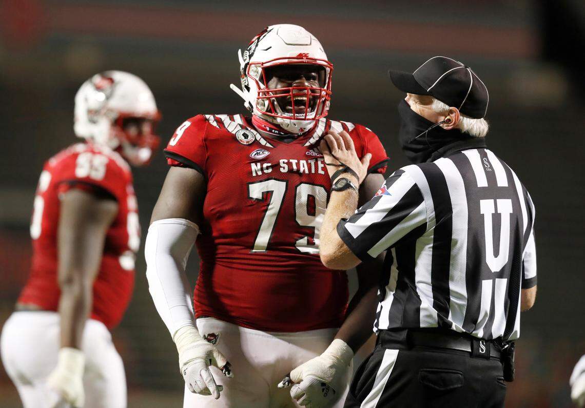 N.C. State offensive tackle Ikem Ekwonu (79) laughs at an opposing lineman during the second half of N.C. State’s 45-42 victory over Wake Forest at Carter-Finley Stadium in Raleigh, N.C, Saturday, Sept. 19, 2020.