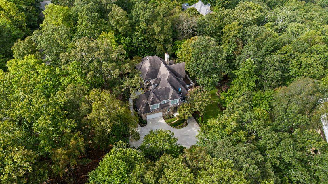 An aerial shot of 32430 Archdale in the Highland Pond neighborhood of Governors Club in Chapel Hill. Custom-built by the late NBA veteran and UNC legend Eric Montross, it’s now up for sale.