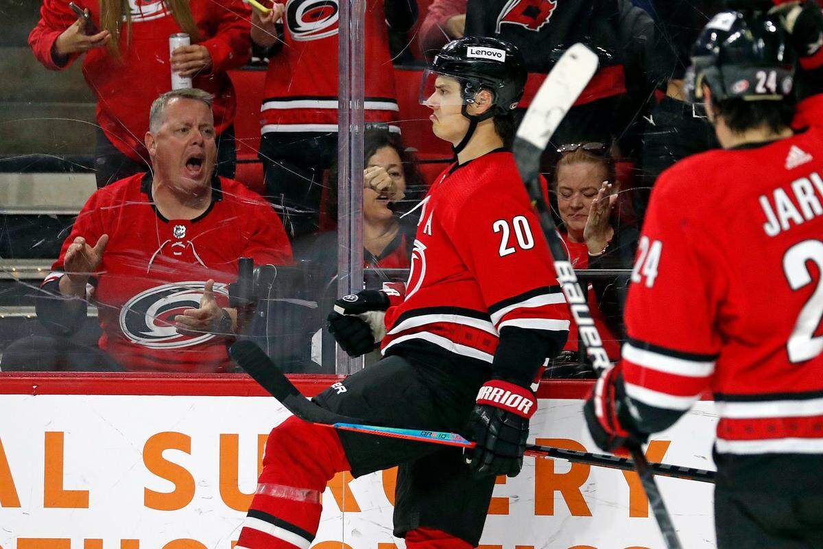 Carolina Hurricanes’ Sebastian Aho (20) celebrates his goal against the Buffalo Sabres during the second period of an NHL hockey game in Raleigh, N.C., Thursday, April 7, 2022. (AP Photo/Karl B DeBlaker)