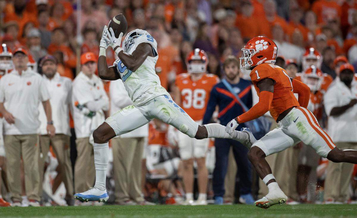 Clemson’s Andrew Mukuba (1) defends North Carolina’s Devontez Walker (9) on a deep pass from quarterback Drake Maye that Walker could not handle, in the third quarter on Saturday, November 18, 2023 at Memorial Stadium in Clemson, S.C.