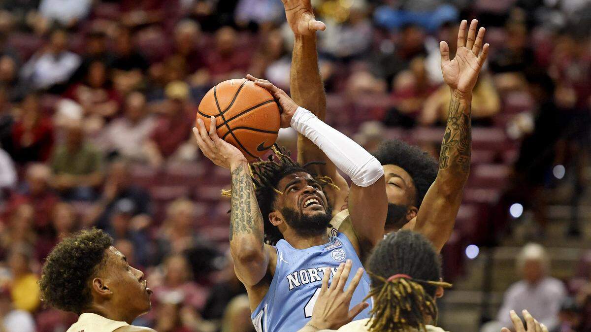 Feb 27, 2023; Tallahassee, Florida, USA; North Carolina Tar Heels guard RJ Davis (4) shoots the ball during the first half against the Florida State Seminoles at Donald L. Tucker Center. Mandatory Credit: Melina Myers-USA TODAY Sports