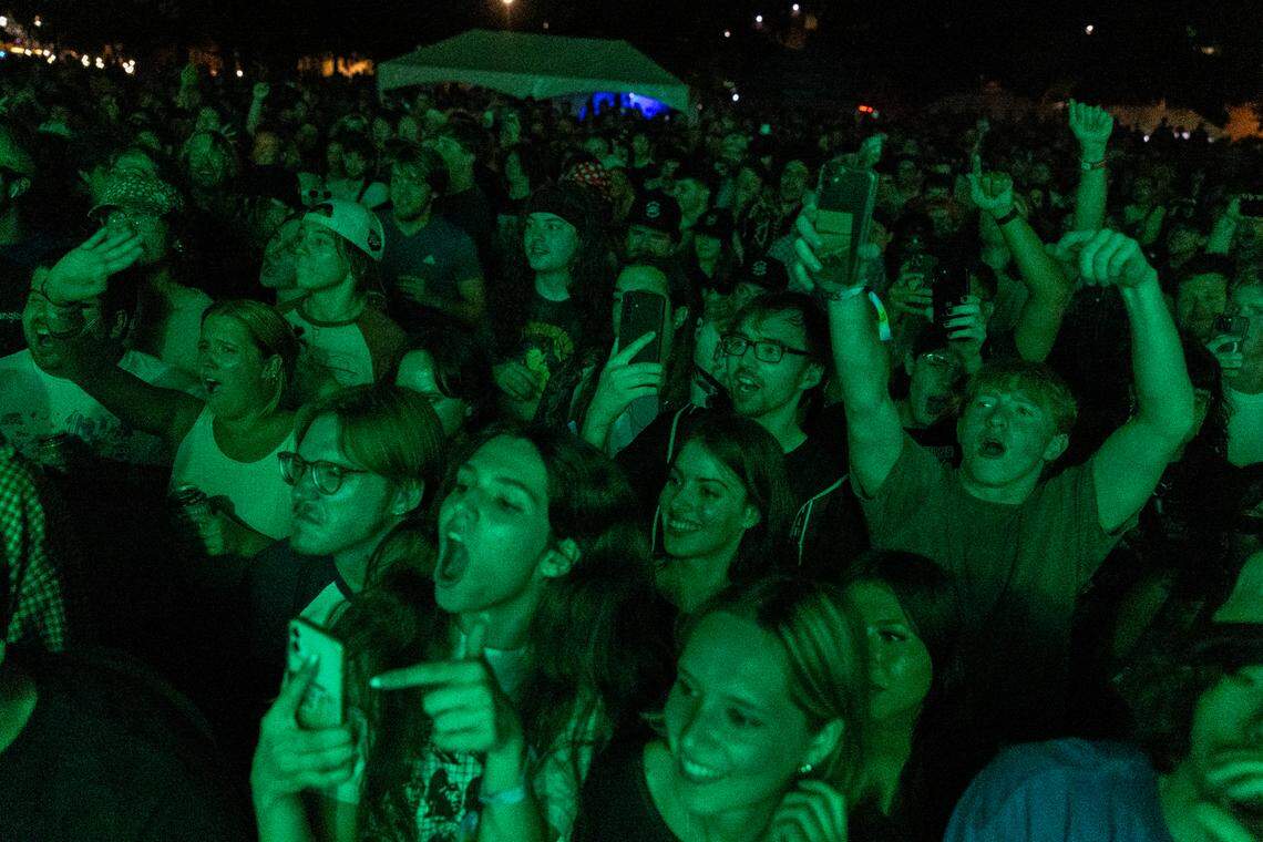 Concert-goers watch JPEGMAFIA perform at Moore Square during the Hopscotch Music Festival in Raleigh on Thursday, Sept 6, 2024.