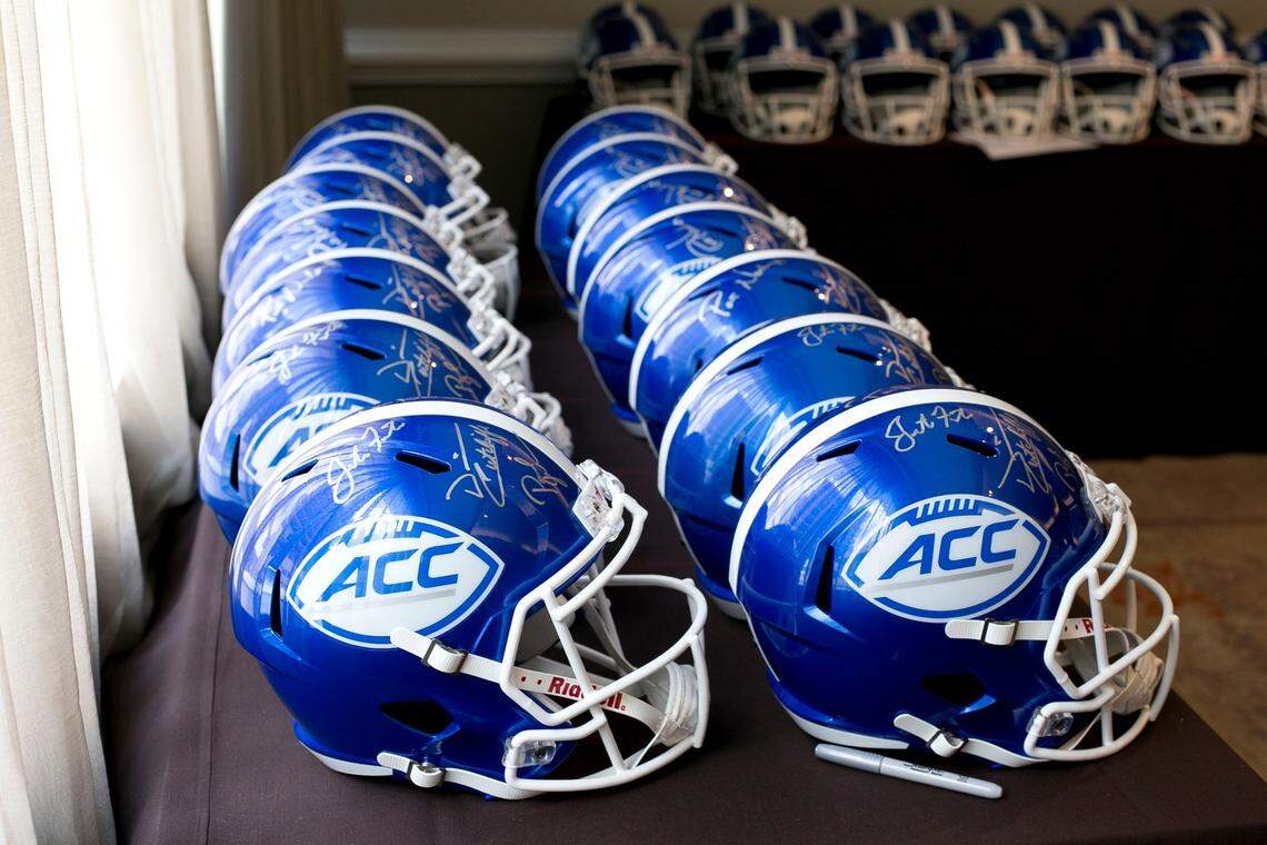 Football helmets with the ACC logo, signed by league coaches, during the ACC Football Kickoff on Thursday, July 21, 2016 at the Westin Hotel in Charlotte, N.C.