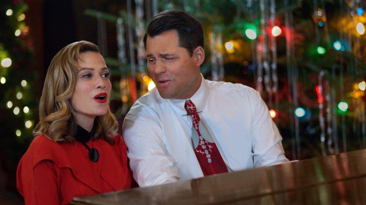 Bethany Joy Lenz and Kristoffer Polaha in “A Biltmore Christmas” on the Hallmark Channel. The movie was filmed at the Biltmore Estate in Asheville, NC, in January 2023.