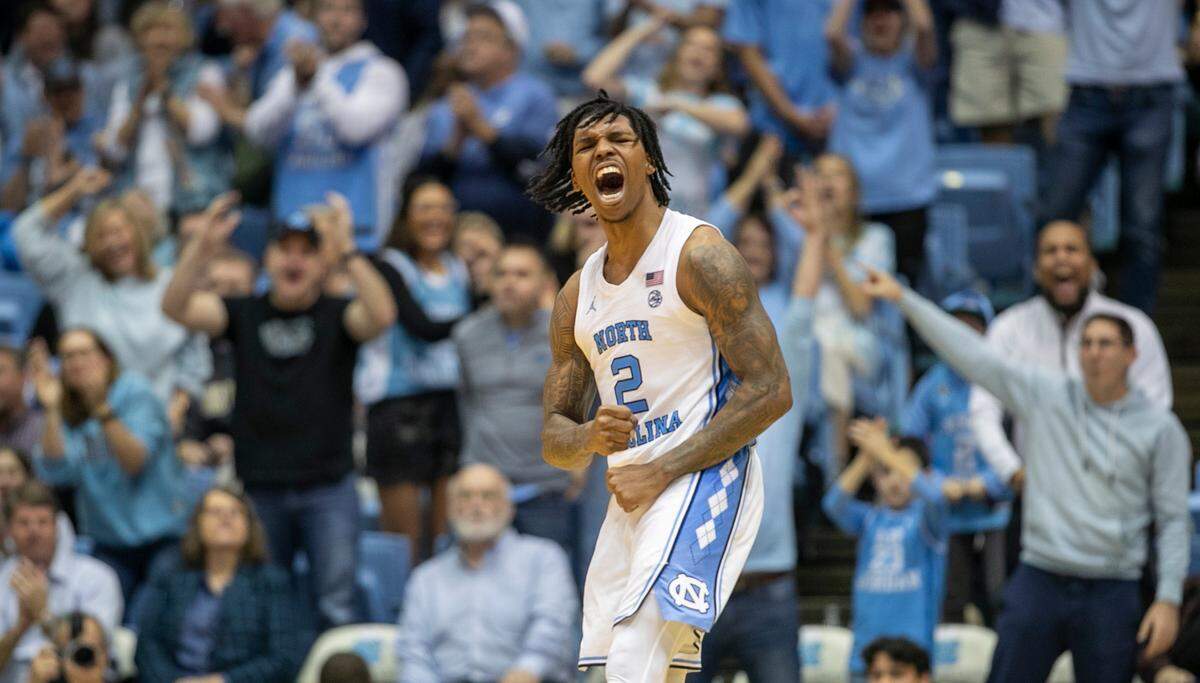 North Carolina’s Caleb Love (2) reacts after sinking a basket to give the Tar Heels’ a 75-67 lead over Wake Forest the second half on Wednesday, January 4, 2023 at the Smith Center in Chapel Hill, N.C. North Carolina defeated Wake Forest 88-79.