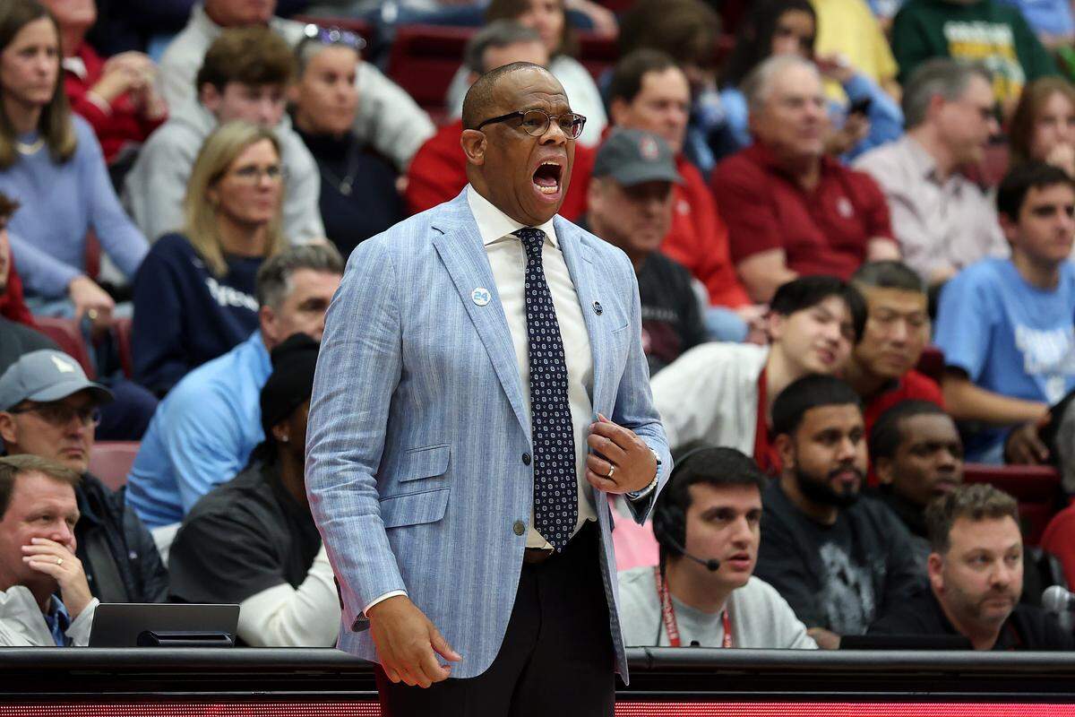 Head coach Hubert Davis of the North Carolina Tar Heels shouts to his team during the second half of their game against the Stanford Cardinal at Stanford Maples Pavilion on January 14, 2026 in Palo Alto, California. 