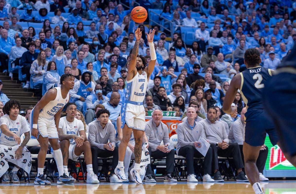 North Carolina’s R.J. Davis (4) launches a three-point shot in the second half against Charleston Southern on Friday, December 29, 2023 at the Smith Center in Chapel Hill, N.C. Davis led the Tar Heels with 20 points.