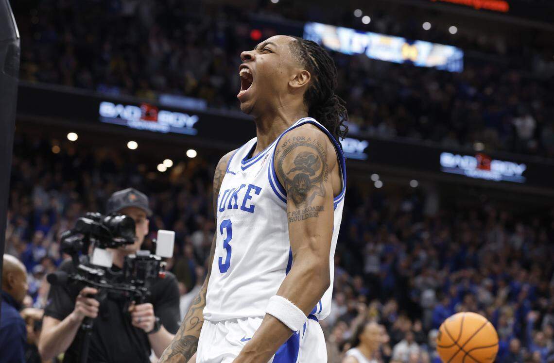 Duke’s Isaiah Evans (3) celebrates after slamming in two as time expires in the second half of Duke’s 68-63 victory over Michigan in the Capital Showcase at Capital One Arena in Washington, D.C., Saturday, Feb. 21, 2026.