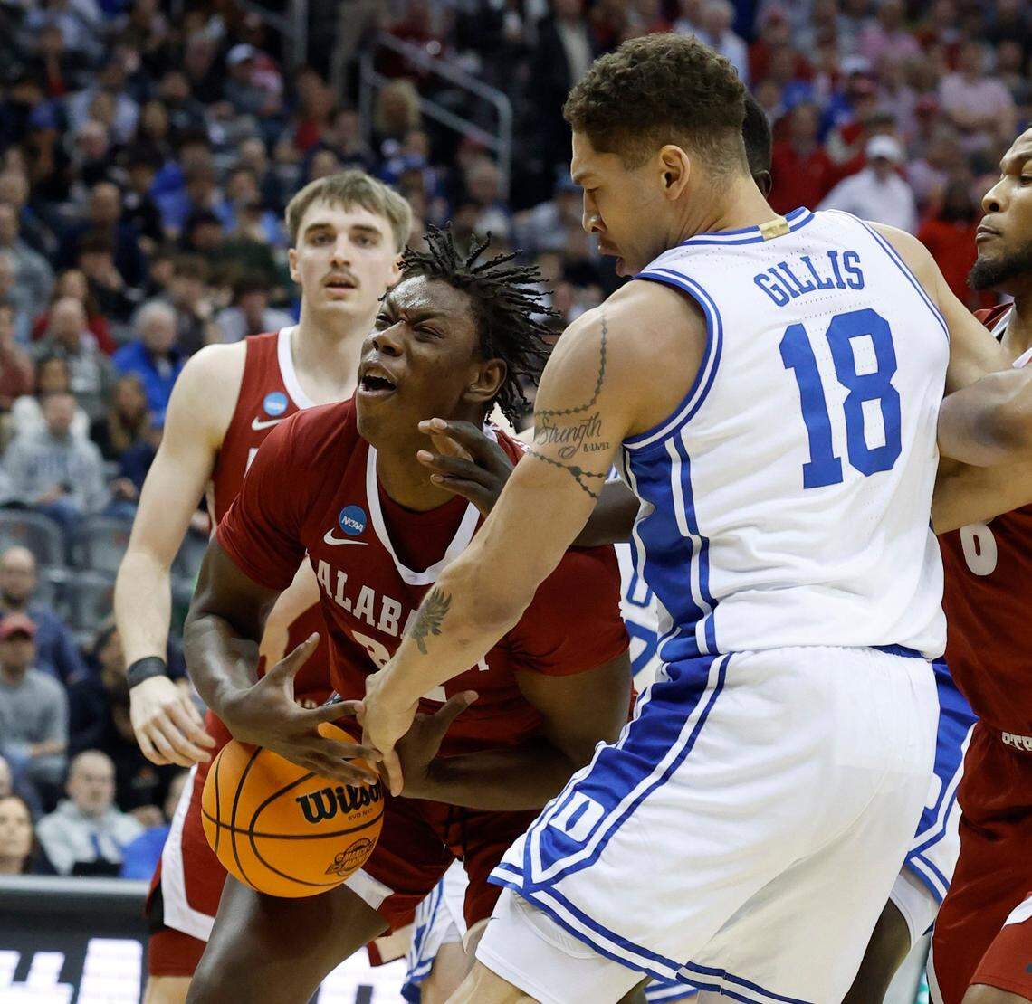 Duke’s Mason Gillis (18) knocks the ball from Alabama’s Aiden Sherrell (22) during the first half of Duke’s game against Alabama in their Elite 8 game in the 2025 NCAA Men’s Basketball Championship at the Prudential Center in Newark, N.J., Saturday, March 29, 2025.