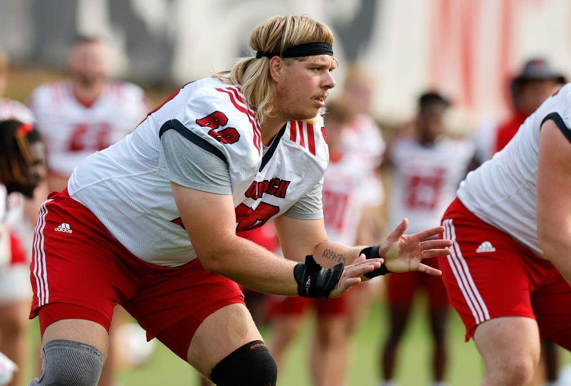 N.C. State offensive lineman Dawson Jaramillo (69) runs a drill during the Wolfpack’s first fall practice in Raleigh, N.C., Wednesday, August 2, 2023.