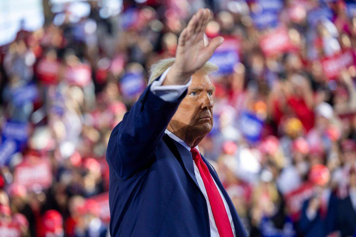 Republican presidential nominee and former President Donald Trump leaves the stage following a rally at Dorton Arena in Raleigh on Monday, Nov. 4, 2024, one day before Election Day.