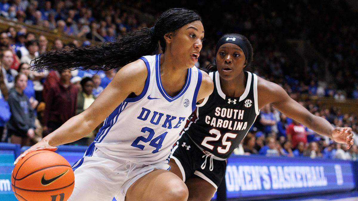 Duke’s Reigan Richardson drives the baseline past South Carolina’s Raven Johnson during the second half of the Blue Devils’ 77-61 loss on Sunday, Dec. 3, 2023, at Cameron Indoor Stadium in Durham, N.C.