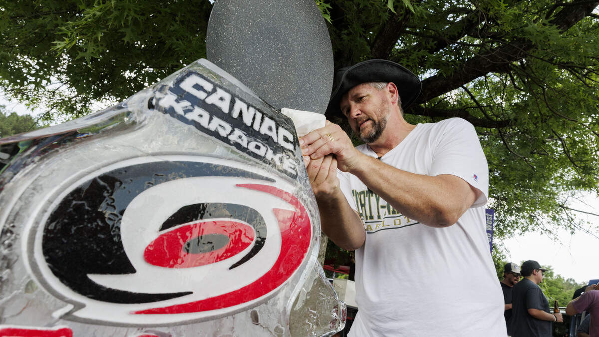 Paul Esterline chisels the edge of the CaneEvels Ice Luge in the parking lot of the Lenovo Center on June 11, 2026, in Raleigh, North Carolina. The Carolina Hurricanes take on the Vegas Golden Knights for Game 5 of the Stanley Cup Final.