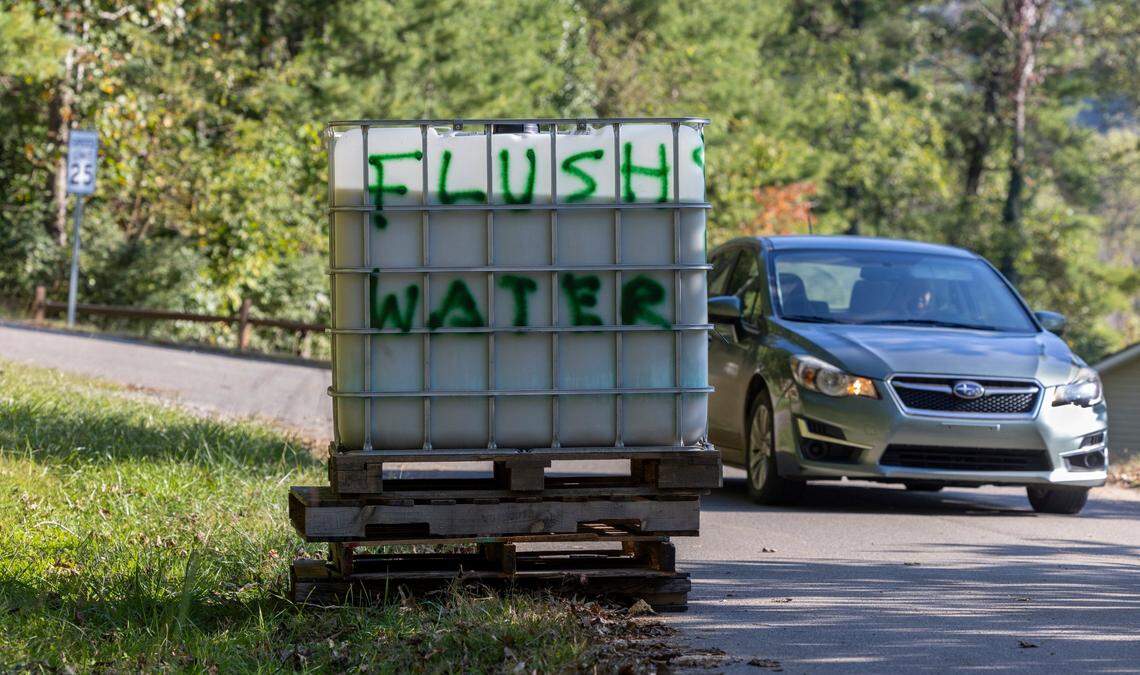A pallet with non-potable water for flushing toilets was set up for Swannanoa residents after Helene hit. The town was one of the hardest hit in North Carolina.