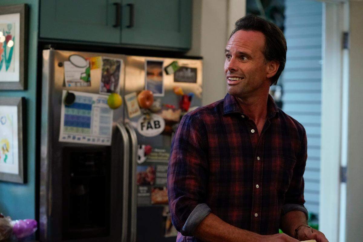 A FAB sticker from Wilmington’s Flaming Amy’s Burrito Barn adorns the refrigerator behind Wade, played by Walton Goggins, on the CBS show “The Unicorn.”